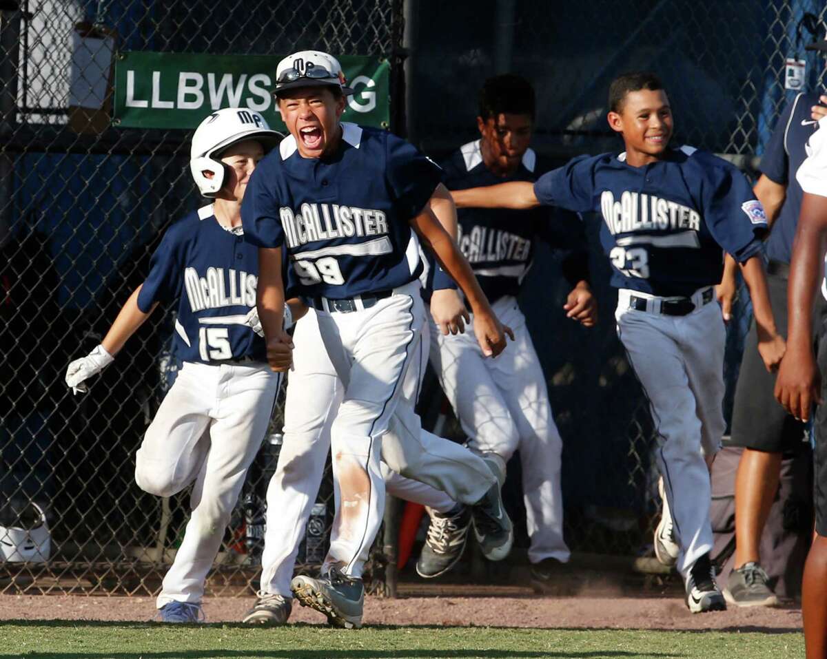 Orion Medina exults after Blake Compton’s home run in the second inning of McAllister Park’s 13-3 victory over Eastdale, N.M., in the Southwest Regional championship Wednesday in Waco.