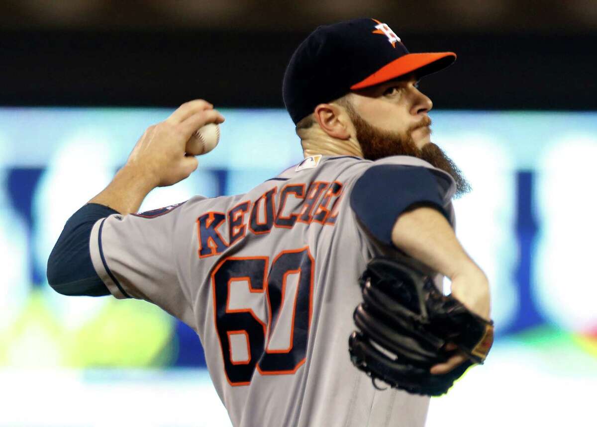 Houston Astros pitcher Dallas Keuchel throws against the Minnesota Twins in the first inning of a baseball game Wednesday, Aug. 10, 2016, in Minneapolis. (AP Photo/Jim Mone)