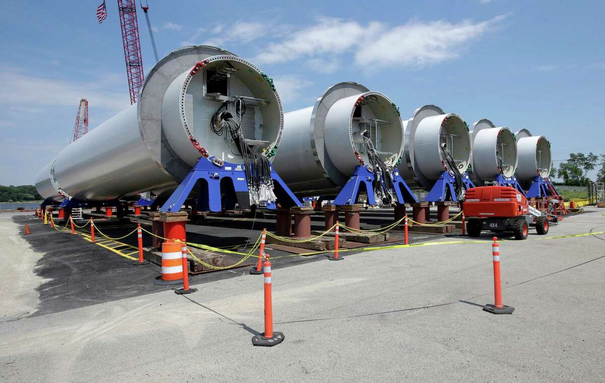 Sections of wind turbine towers sit at a staging site at Port of Providence Deepwater Wind. Click through to see recent U.S. energy consumption by type. 