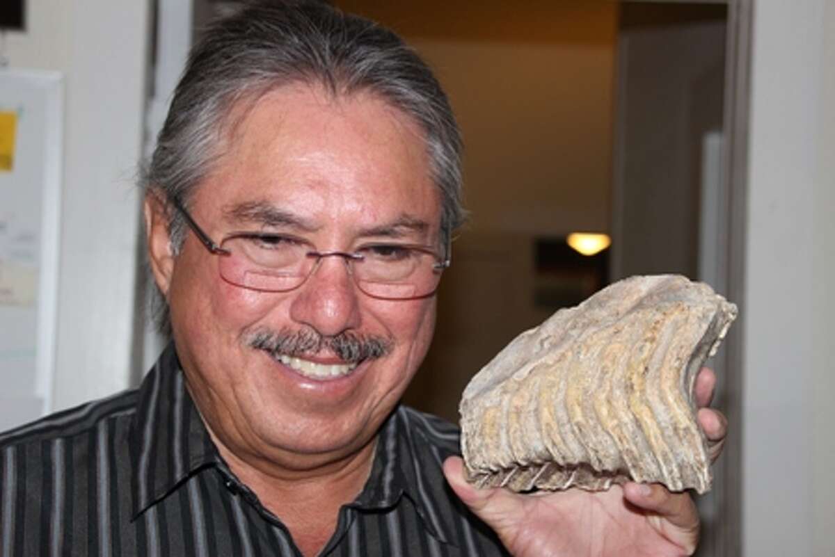 Henry Gutierrez Jr. smiles as he shows one of his many fossils in this photo taken in May 2015. Gutierrez, who grew up on the family farm in Schertz, was killed by an unknown assailant(s) Dec. 24, 2015.