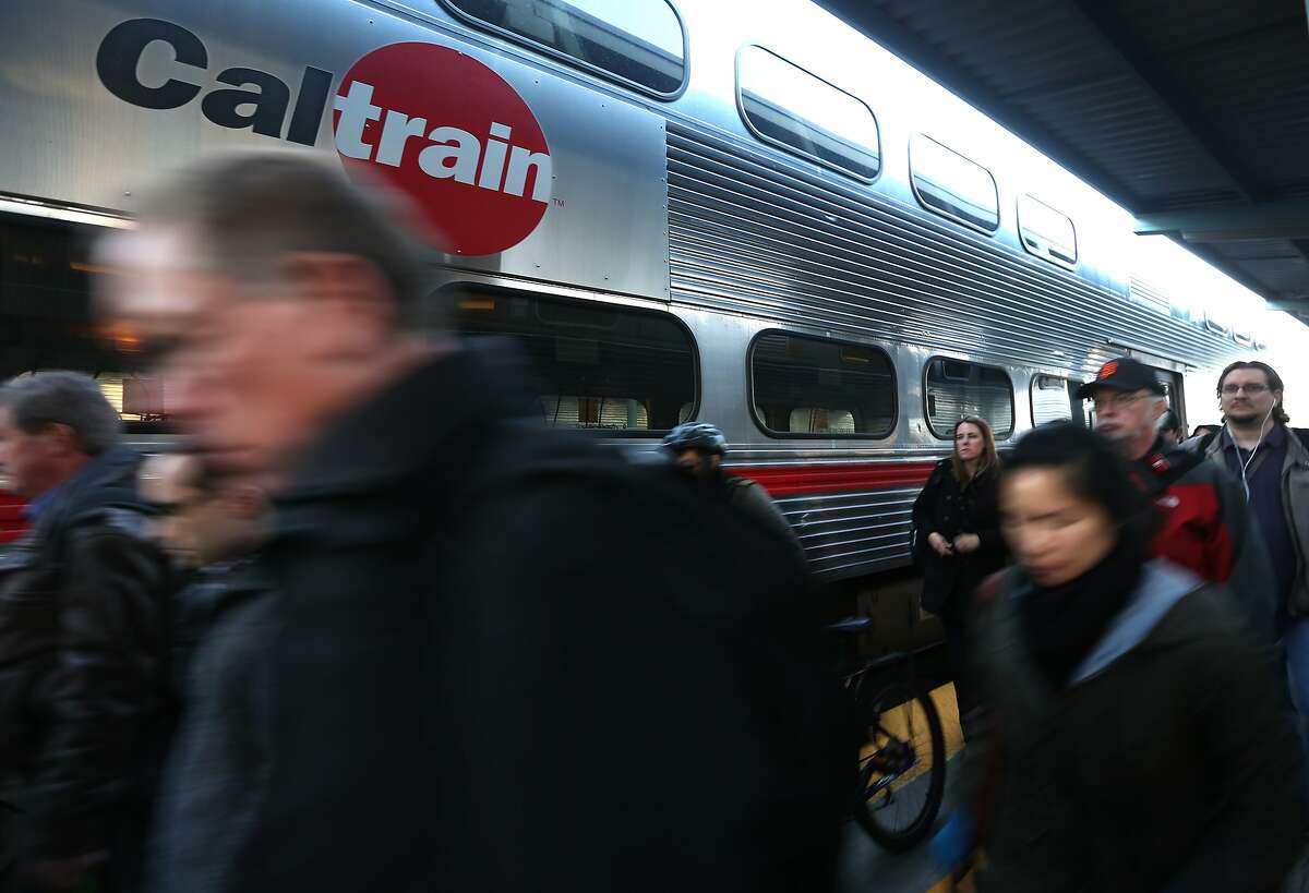 Commuters arrive at the Caltrain station on Fourth and King streets in San Francisco.