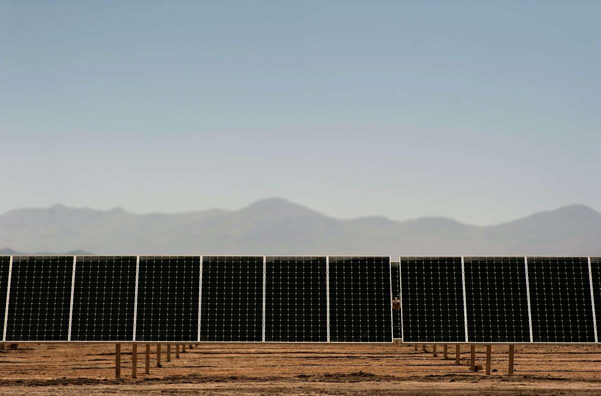 Picture taken on January 23, 2015 of the newly finished PV Salvador solar plant near El Salvador, in the Atacama desert, northern Chile. The photovoltaic plant, built by SunPower, a California-based branch of Total, with a maximum output of 70 Megawatts, is one of the world biggest solar plants. AFP PHOTO/Vladimir Rodas (Photo credit should read VLADIMIR RODAS/AFP/Getty Images)