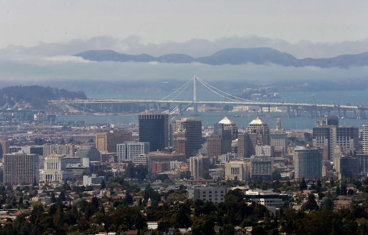Looking across the bay to the skyline of Oakland, the Bay Bridge and the Marin Headlands from the hills of Oakland, California on Fri. Aug. 12, 2016.