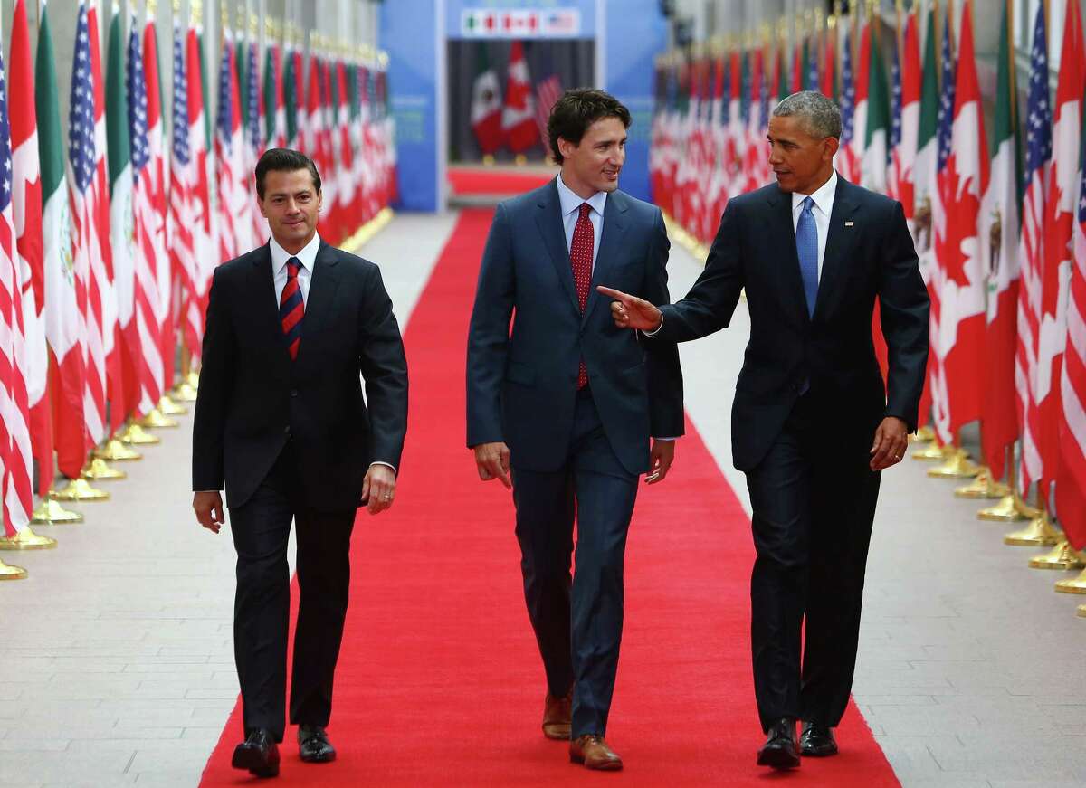 Enrique Pena Nieto, Mexico's president, from left, Justin Trudeau, Canada's prime minister, and U.S. President Barack Obama arrive at the National Gallery of Canada for the North American Leaders Summit (NALS) in Ottawa, Ontario, Canada, on Wednesday, June 29, 2016. Leaders from the three Nafta nations "agree on the need for governments of all major steel-producing countries to make strong and immediate commitments to address the problem of global excess steelmaking capacity," according to a statement from Trudeau. ( Cole Burston/Bloomberg)
