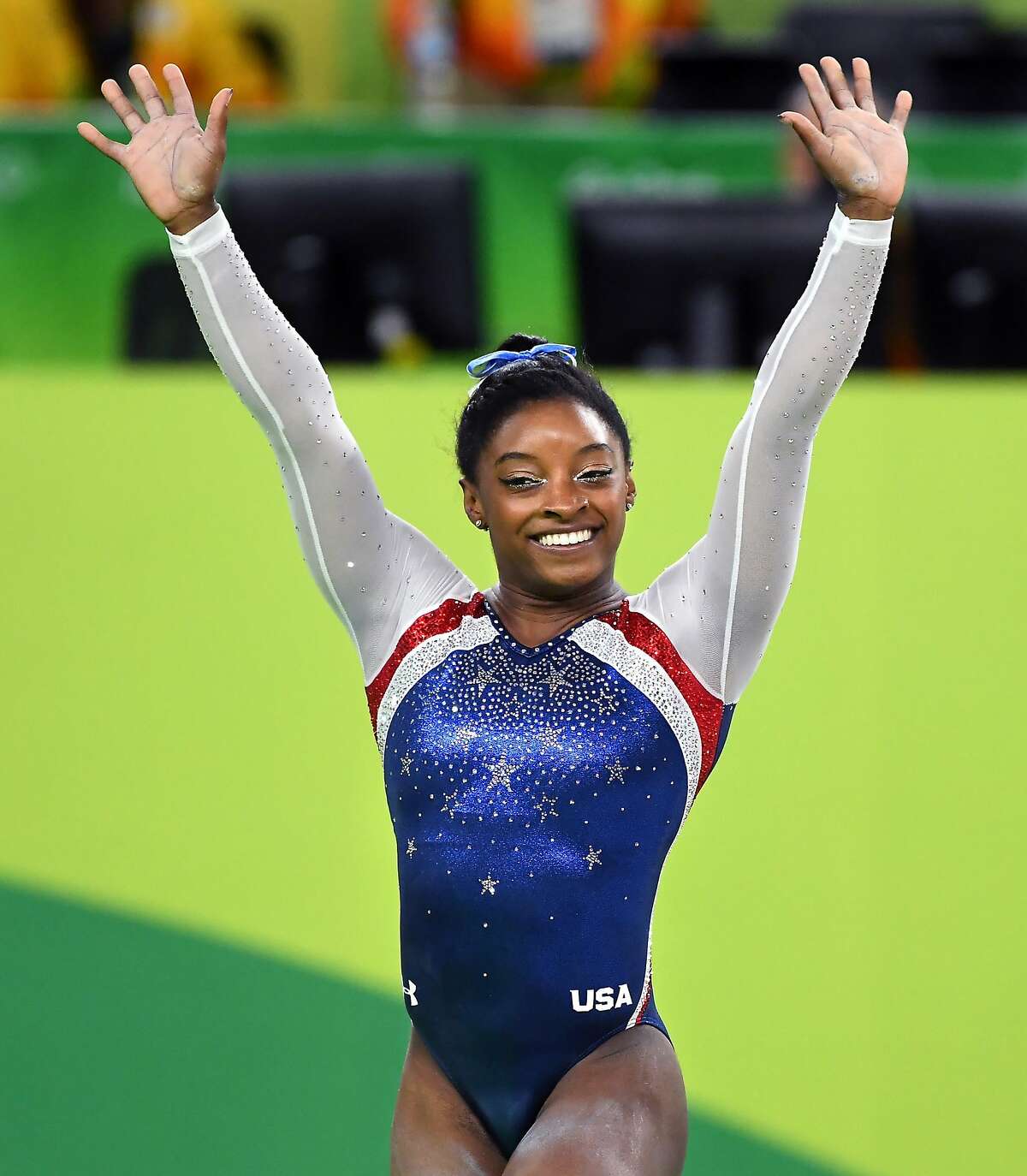 U.S. gymnast Simone Biles celebrates her gold medal in the women's All-Around Individual at the Summer Olympics in Rio de Janeiro, Brazil, on Thursday, Aug. 11, 2016. (Wally Skalij/Los Angeles Times/TNS)