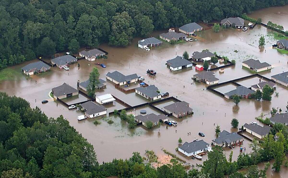 Scores rescued in Louisiana floods