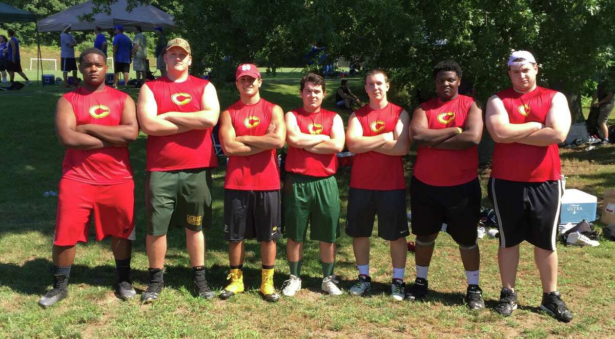 The Trinity Catholic linemen pose at the Connecticut Lineman Challenge in Berlin. The Crusaders took ninth in the event.