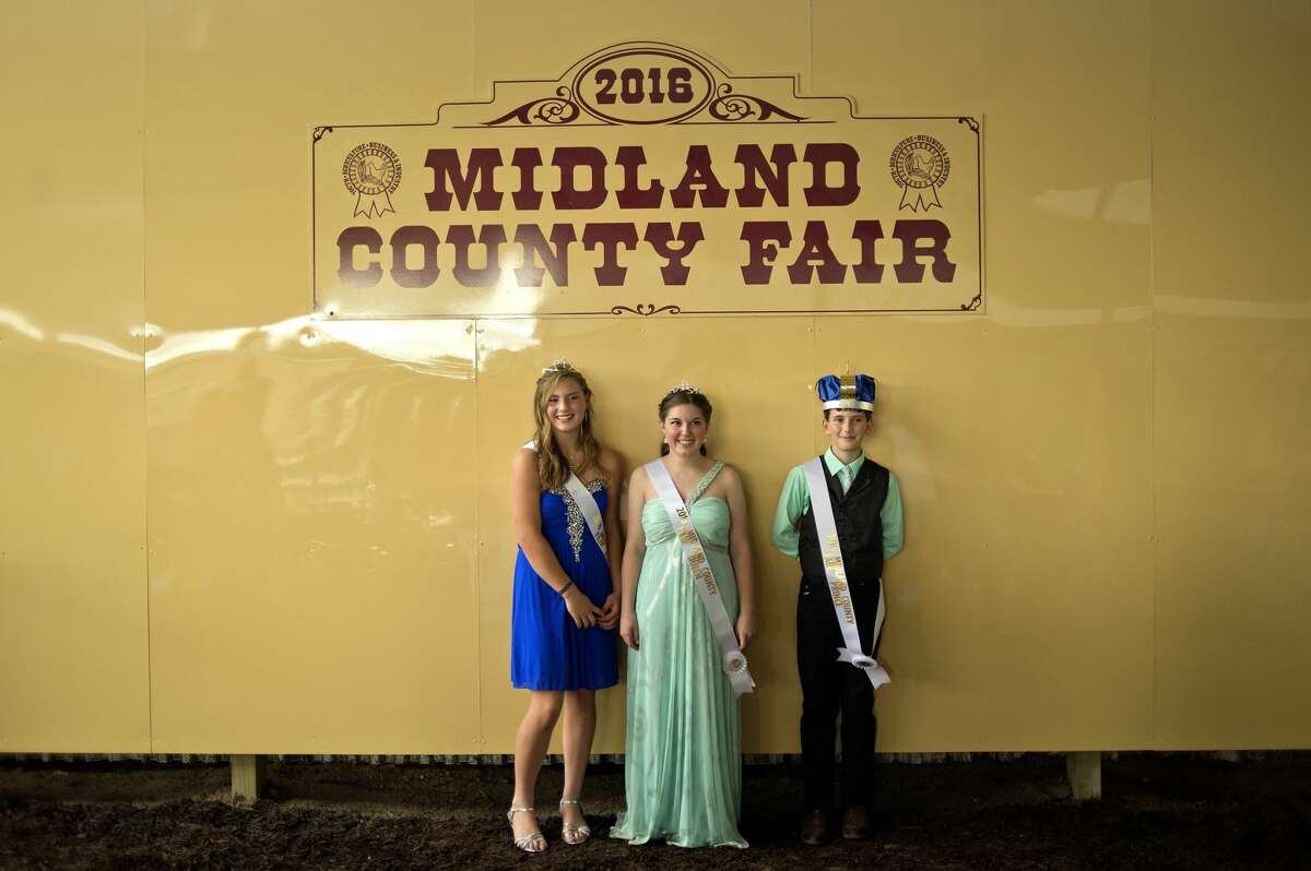 From left, 2016 Midland County Fair royalty princess Audrey Martin, queen Jordan McRoberts and prince Hunter Buczek stand for pictures during the Midland County Fair Royalty Contest on Saturday at the Midland County Fairgrounds. There were no king contestants registered for this year's contest.