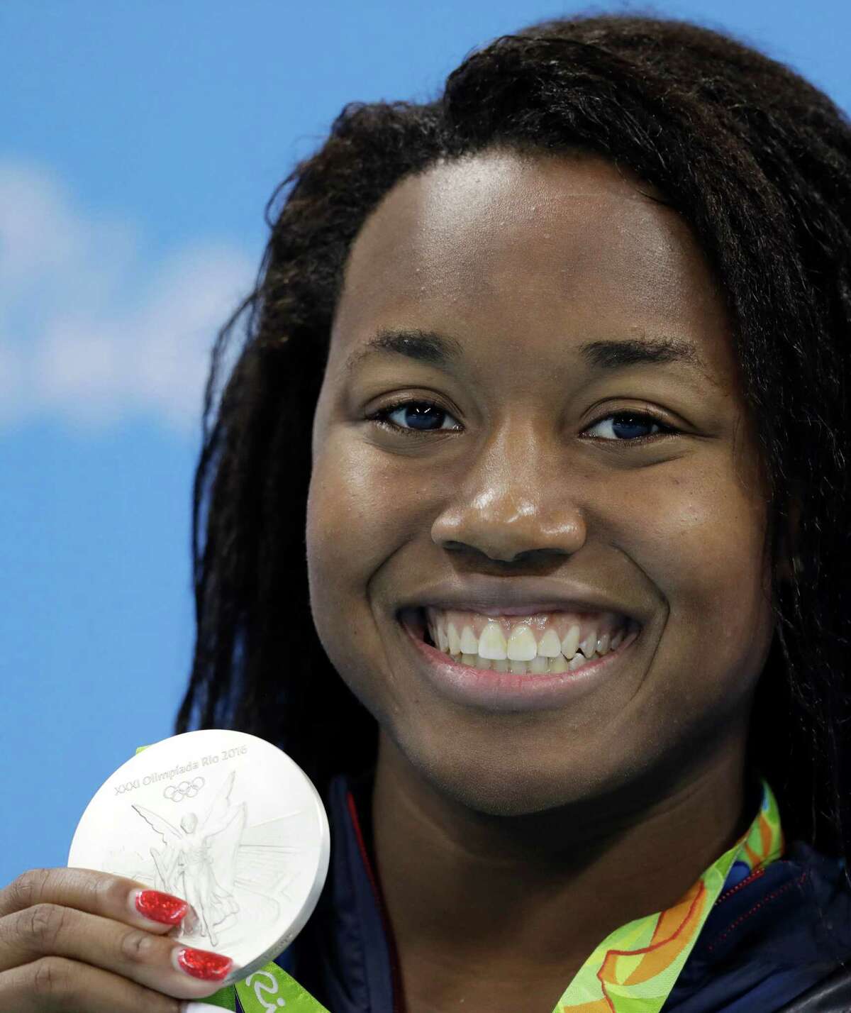 Simone Manuel wins gold, silver