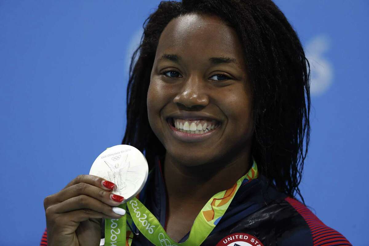 Simone Manuel wins gold, silver