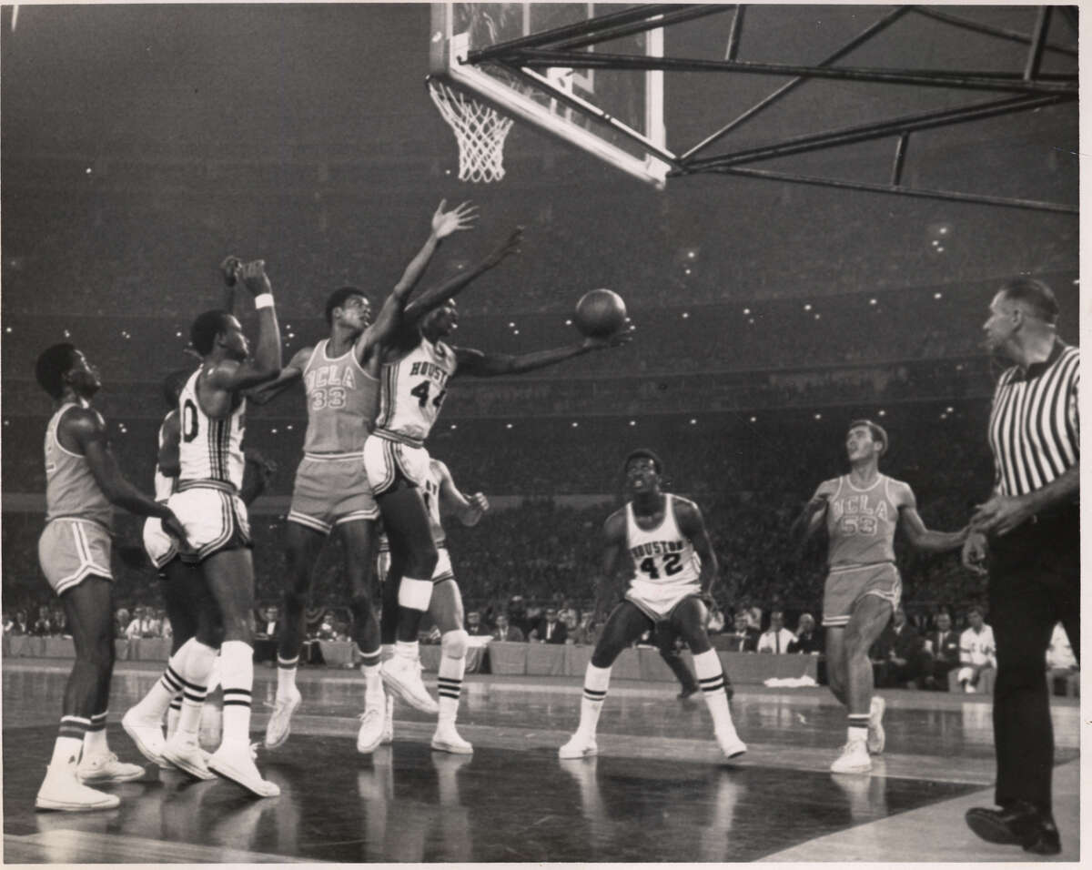 Elvin Hayes grabs a rebound from UCLA's Lew Alcindor in their Astrodome match on Jan. 20, 1968. Alcindor later changed his name to Kareem Abdul-Jabbar. (Houston Chronicle file)