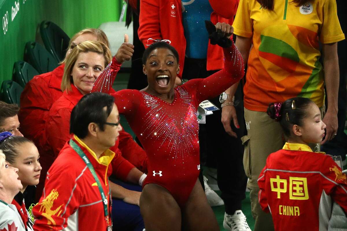 RIO DE JANEIRO, BRAZIL - AUGUST 14: Simone Biles of the United States celebrates winning the gold medal in the Women's Vault Final on Day 9 of the Rio 2016 Olympic Games at the Rio Olympic Arena on August 14, 2016 in Rio de Janeiro, Brazil. (Photo by Patrick Smith/Getty Images)