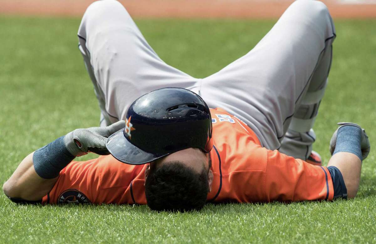 Astros' Jake Marisnick leaves game with 'knee discomfort