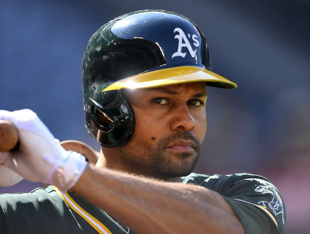 Oakland Athletics' Coco Crisp waits to bat during the first inning of a baseball game against the Los Angeles Angels, Thursday, Aug. 4, 2016, in Anaheim, Calif. (AP Photo/Mark J. Terrill)