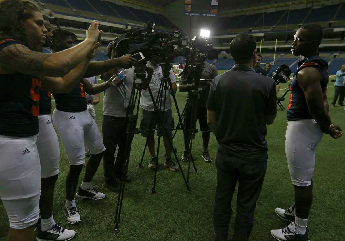 UTSA’s Jared Johnson (right) answers questions during media day on Aug. 15, 2016 at the Alamodome.