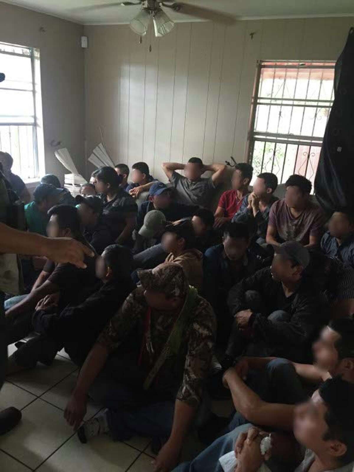 Border Protection agents found 34 undocumented immigrants living inside a home in San Juan. Two smugglers were arrested during the find.