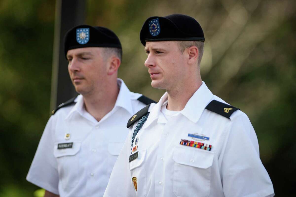 Sgt. Bowe Bergdahl, right, arrives with his military lawyer, Lt. Col. Franklin Rosenblatt, for a legal hearing at the courtroom facility on Thursday, July 7, 2016, on Fort Bragg, N.C. Bergdahl, who disappeared in Afghanistan in 2009 and was held by the Taliban for five years, is charged with desertion and misbehavior before the enemy. (Andrew Craft/The Fayetteville Observer via AP)