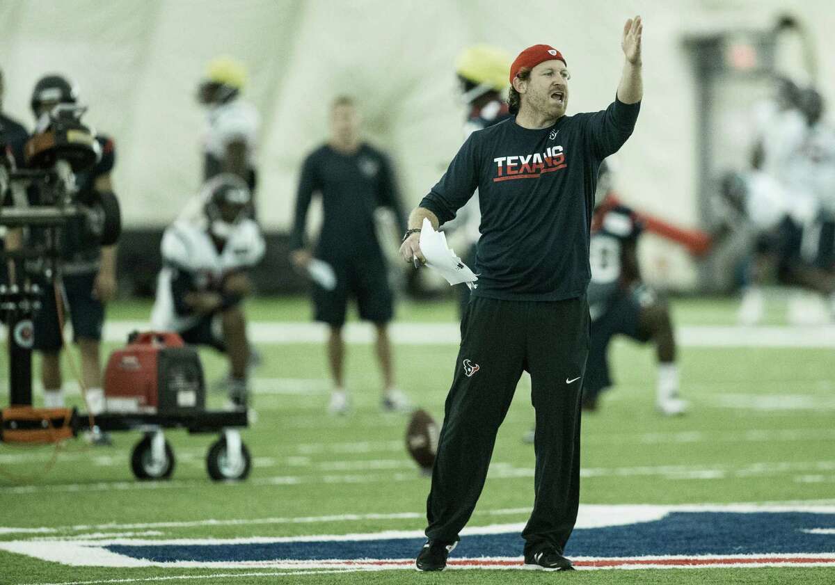 Houston Texans special teams coordinator Larry Izzo calls a play during Texans training camp at Houston Methodist Training Center on Tuesday, Aug. 16, 2016, in Houston.