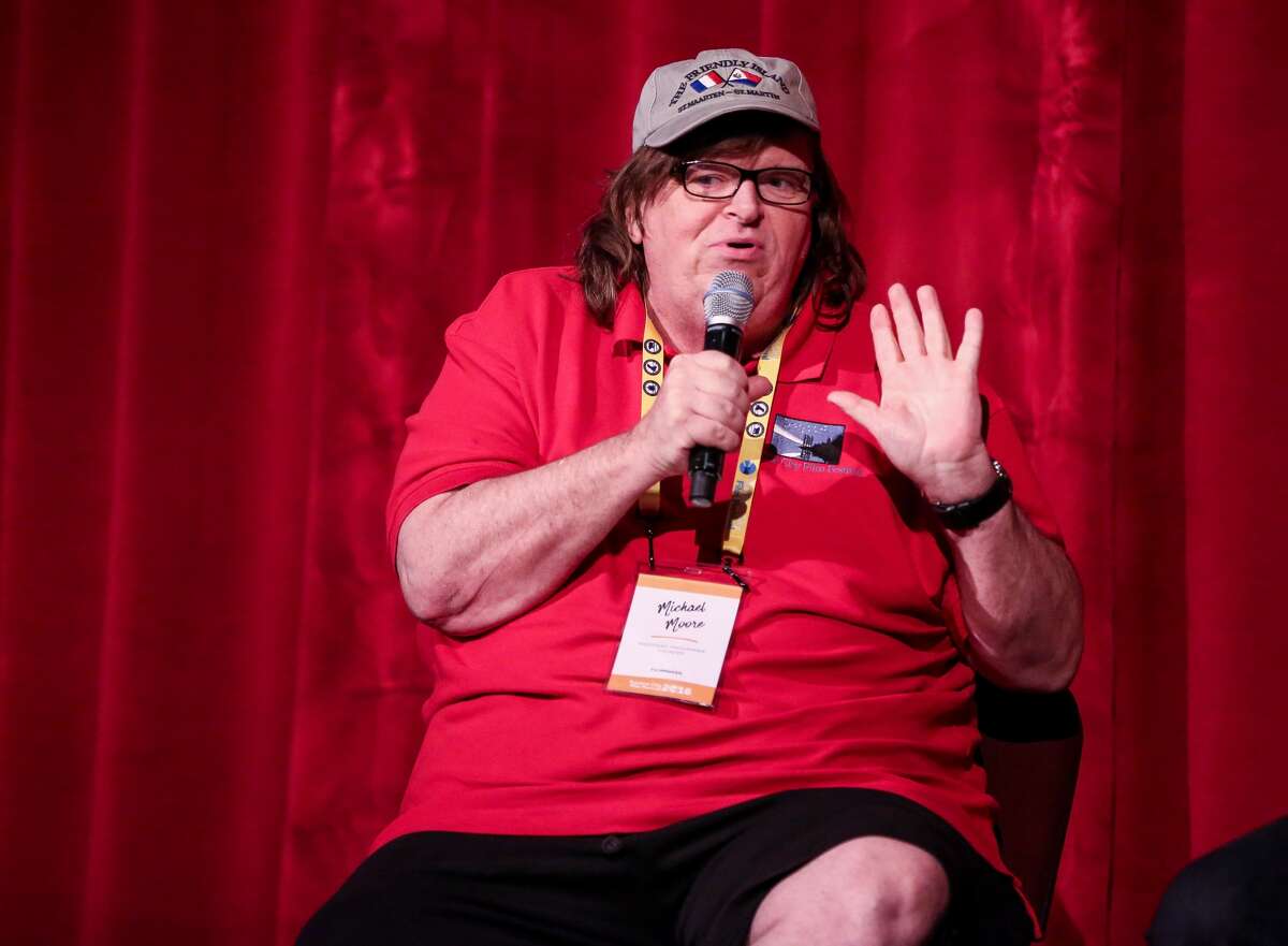 Michael Moore: "Jackie Robinson on the national anthem: 'I cannot stand & sing the anthem, I cannot salute the flag. I know I am a black man in a white world.'" (@MMFlint/ Twitter)