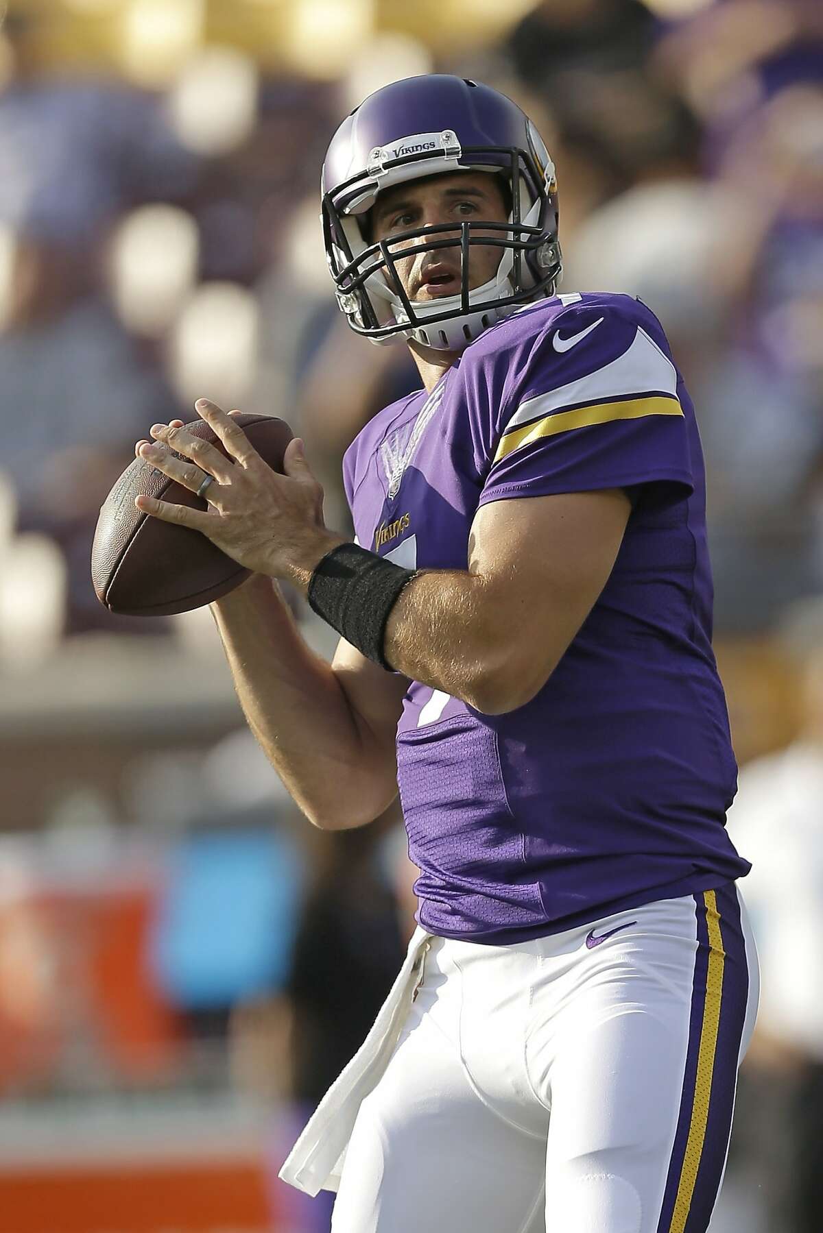 Minnesota Vikings Christian Ponder runs through some drills before the game against the Oakland Raiders, Friday, Aug. 8, 2014 in Minneapolis. (Mike McGinnis/AP Images for Panini)