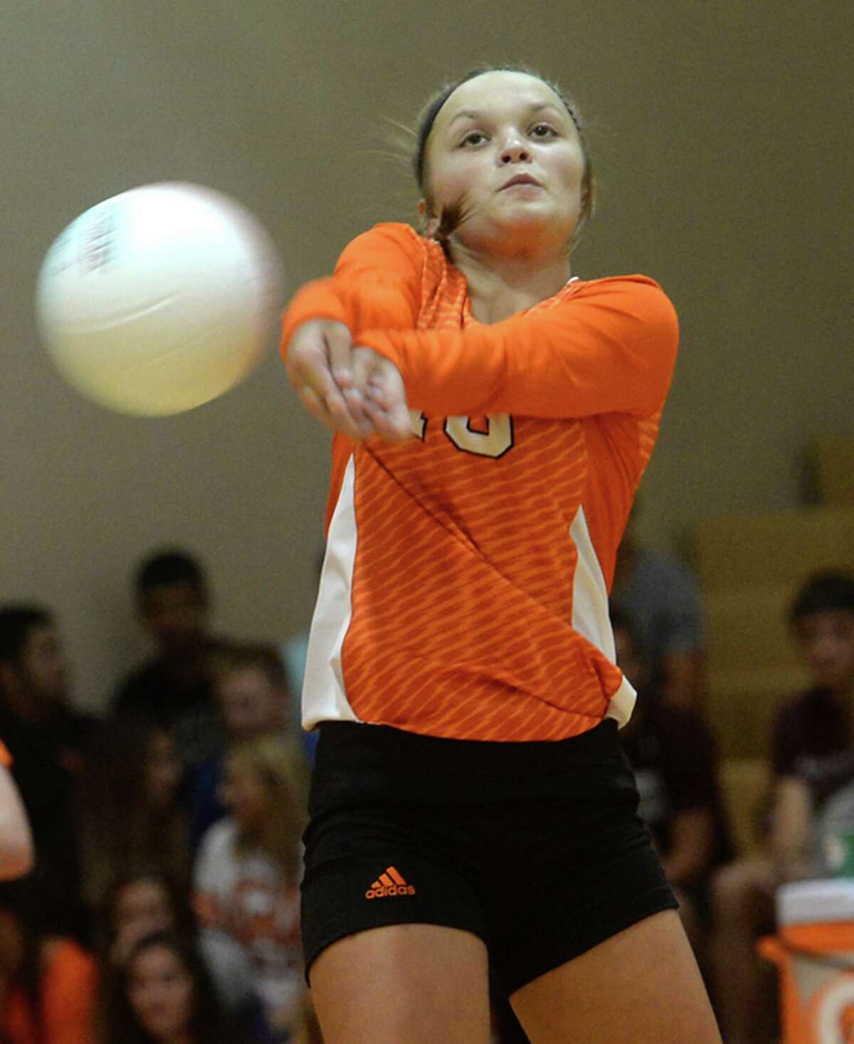 Orangefield's Faith Fregia tries to return on the volley with Port Neches - Groves during Tuesday's varsity match-up at Orangefield High School. Photo taken Tuesday, August 16, 2016 Kim Brent/The Enterprise