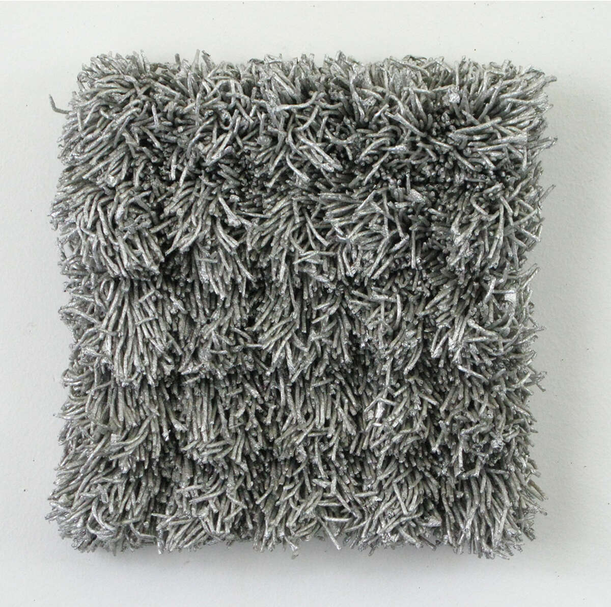 Susie Rosmarin's "Untitled (Aluminum Grid)" is among works in "Right Here, Right Now, v. 2" at the Contemporary Â Arts Museum Houston. (Â 1988. Aluminum foil, stainless steel mesh, 22 x 20 x 4 1/2 inches. Courtesy the artist and Texas Gallery, Houston. Image courtesy Texas Gallery, Houston.)