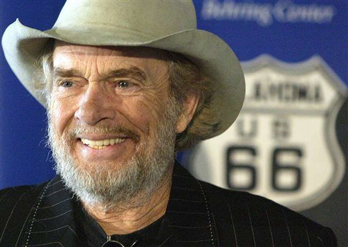 In this May 28, 2003 file photo, country music legend Merle Haggard smiles during a news conference at the Smithsonian's National Museum of American History in Washington where he and his sister Lillian Haggard Hoge donated belongings taken on their family's Dust Bowl-era move from Oklahoma to California on Route 66. Haggard died of pneumonia, Wednesday, April 6, 2016, in Palo Cedro, Calif. He was 79. (AP Photo/Rick Bowmer)