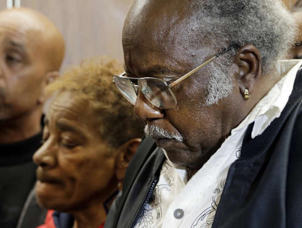 Porter Alexander and his wife Mary, parents of murder victim Alicia Alexander face reporters after first-degree murder verdicts were returned against 'Grim Sleeper' killer Lonnie Franklin Jr., in the death of their daughter and nine others, in Los Angeles Superior Court Thursday, May 5, 2016. (Nick Ut)
