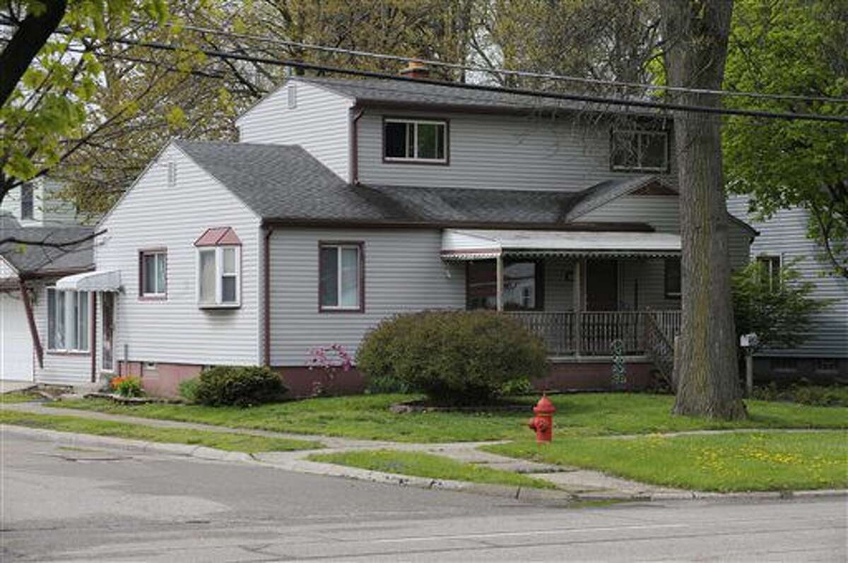 The house where 21-year-old Jessica White's body was found Tuesday night is seen in Hazel Park, Mich., Wednesday, May 4, 2016. Hazel Park police said they have arrested a 23-year-old man who lived in the home. He's described as a friend of hers. (Clarence Tabb Jr./Detroit News via AP