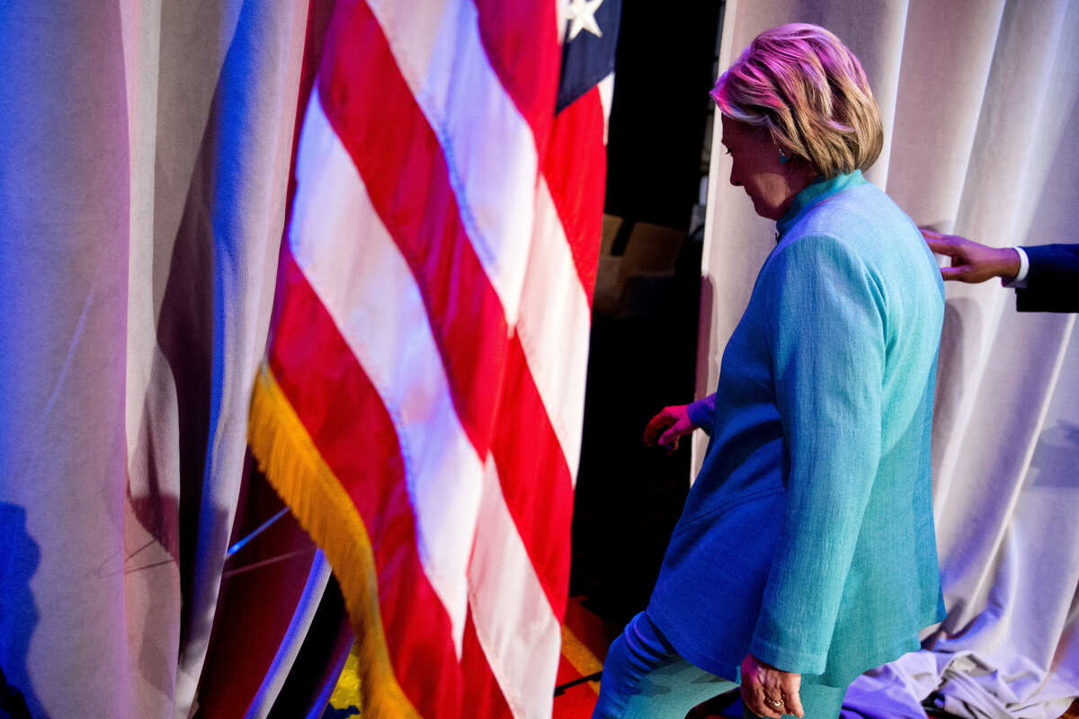 Democratic presidential candidate Hillary Clinton departs after speaking at the U.S. Conference of Mayors in Indianapolis, Sunday, June 26, 2016, on the United Kingdom's vote to leave the European Union, America's economy, and other issues. (AP Photo/Andrew Harnik)