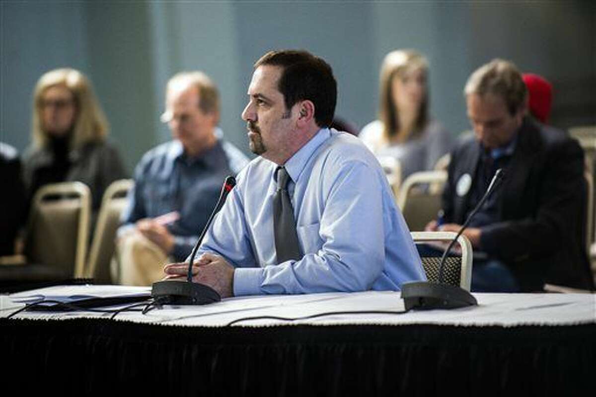 In this March 29, 2016, file photo, Mike Glasgow, Flint laboratory and water quality supervisor, speaks during a meeting of Michigan's special Joint Committee on the Flint Water Public Health Emergency in downtown Flint. (Jake May/The Flint Journal-MLive.com via AP, File)