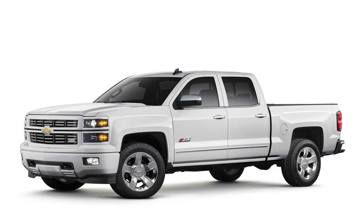 This photo provided by General Motors shows 2015 Chevrolet Silverado 1500 LTZ Z71 with Custom Sport special edition package. On Friday, April 15, 2016, General Motors is recalling more than a million Chevrolet Silverado and GMC Sierra pickup trucks worldwide because the seat belts may not hold people in a crash. The recall covers certain model 1500 pickups from the 2014 and 2015 model years. GM says a steel cable that connects the belts to the trucks can wear and separate over time. If that happens, the belts could come loose. (General Motors via AP)