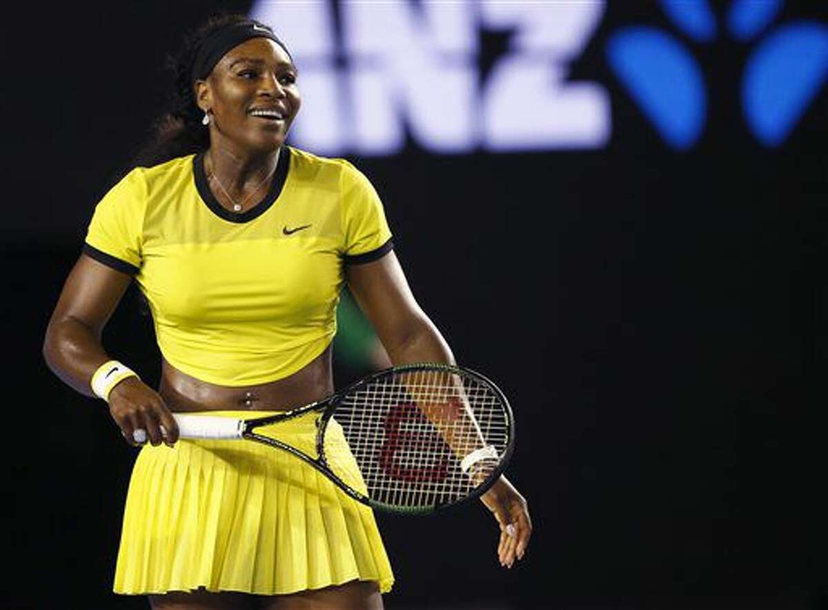 In this Jan. 28, 2016, file photo, Serena Williams smiles during her semifinal match against Agnieszka Radwanska of Poland at the Australian Open tennis championships in Melbourne, Australia. Top-ranked Williams recounted Sunday, May 8, how she came to have a part in the Beyonce's video, "Lemonade." (AP Photo/Rafiq Maqbool)