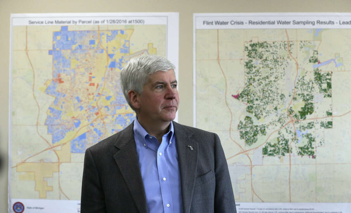FILE--In this Feb. 18, 2016 file photo, Gov. Rick Snyder addresses the media in Flint, Mich. Michigan would have the toughest lead-testing rules in the nation and require the replacement of all underground lead service pipes in the state under a sweeping plan Gov. Rick Snyder and a team of water experts will unveil Friday, April 15, 2015 in the wake of Flint's water crisis. (AP Photo/Carlos Osorio)