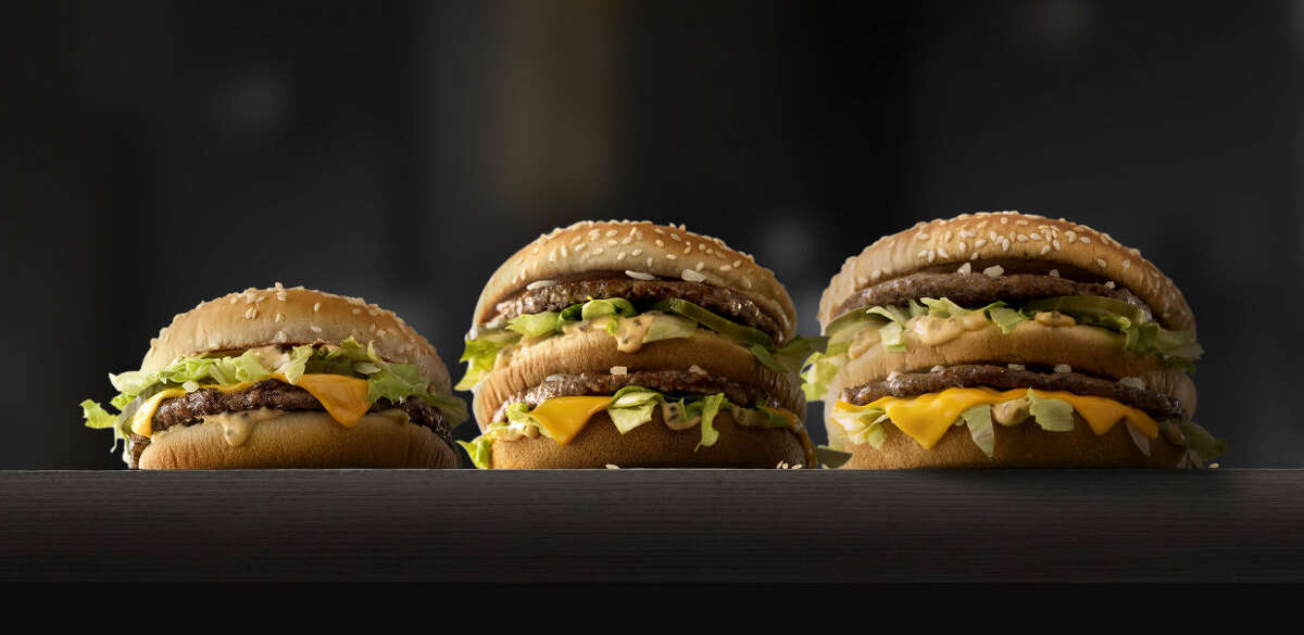 This photo provided by McDonald's shows, from left to right: McDonald's Mac Jr., Big Mac and Grand Mac. McDonald's is testing bigger and smaller versions of its Big Mac as the world's biggest hamburger chain pushes to revive its business. The company says it's testing the Grand Mac and Mac Jr. in the Central Ohio and the Dallas areas, and will see how they do before deciding on a national rollout. (McDonald's via AP) MANDATORY CREDIT