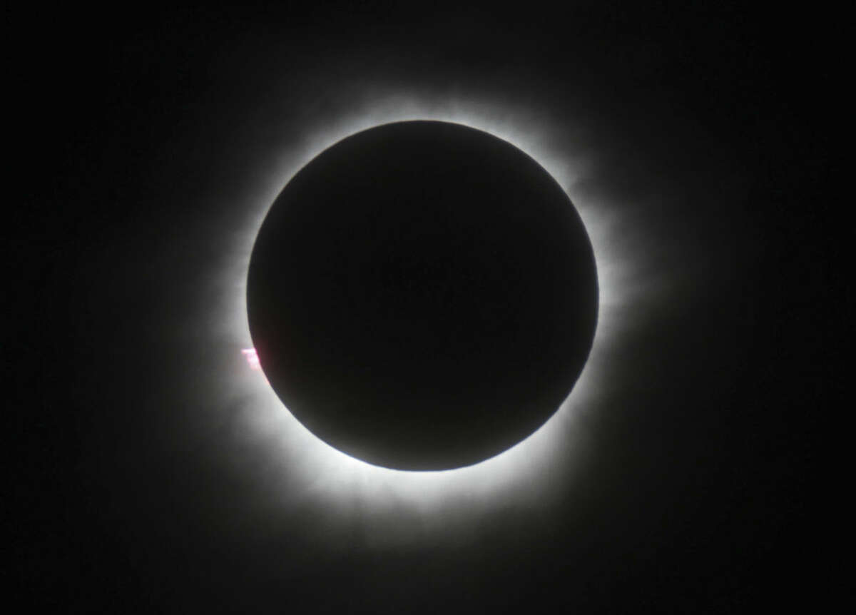 FILE - This March 9, 2016 file photo shows a total solar eclipse in Belitung, Indonesia. Hotel rooms already are going fast in Wyoming and other states along the path of next year’s solar eclipse. The total solar eclipse on Aug. 21, 2017, will be the first in the mainland U.S. in almost four decades. (AP Photo, File)
