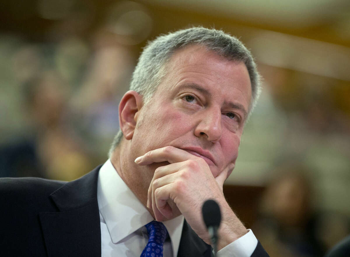 FILE - In this Jan. 26, 2016, file photo, New York City Mayor Bill de Blasio testifies during a joint legislative budget hearing on local government in Albany, N.Y. New York City's effort to monitor mentally ill people considered potentially violent has stirred unease among civil liberties and mental health advocates but de Blasio has said the program aims to protect public safety and provide treatment. (AP Photo/Mike Groll, File)