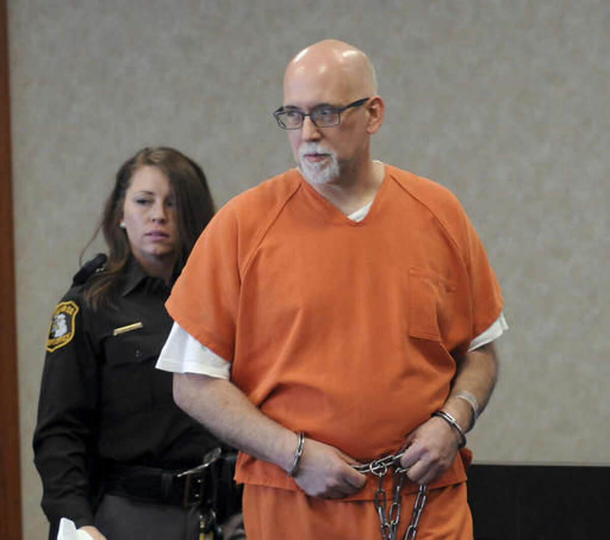 In this April 11, 2016 photo, former Dryden schools superintendent, Thomas Goulette, walks into court in Port Huron, Mich. According to court records, 51-year-old Goulette was sentenced to three-and-a-half to 20 years in prison on a charge of armed robbery Monday, May 16, 2016. He pleaded guilty last month to the January robbery of a Brockway Township bank. (Andrew Jowett/Port Huron Times Herald via AP)