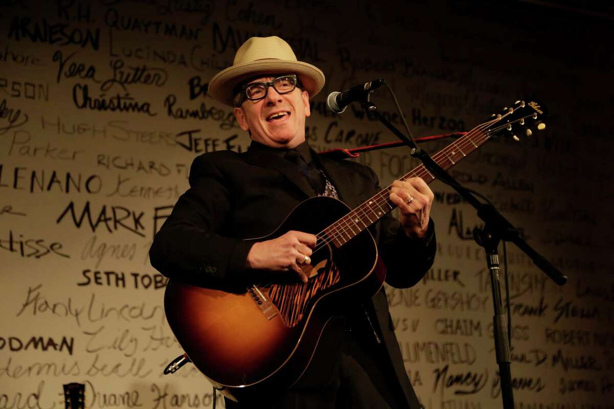 PHOTO MOVED IN ADVANCE AND NOT FOR USE - ONLINE OR IN PRINT - BEFORE NOV. 23, 2014. -- Elvis Costello performs at the Whitney Museum of American Artas 2014 Gala and Studio Party at the Breuer Building in New York, Nov. 19, 2014. The event, honoring the 98 living artists who have had survey exhibitions in the historic Breuer Building, and noting the Whitneyas departure for downtownas greener pastures, was awash in nostalgia. (Erin Baiano/The New York Times) ORG XMIT: XNYT63