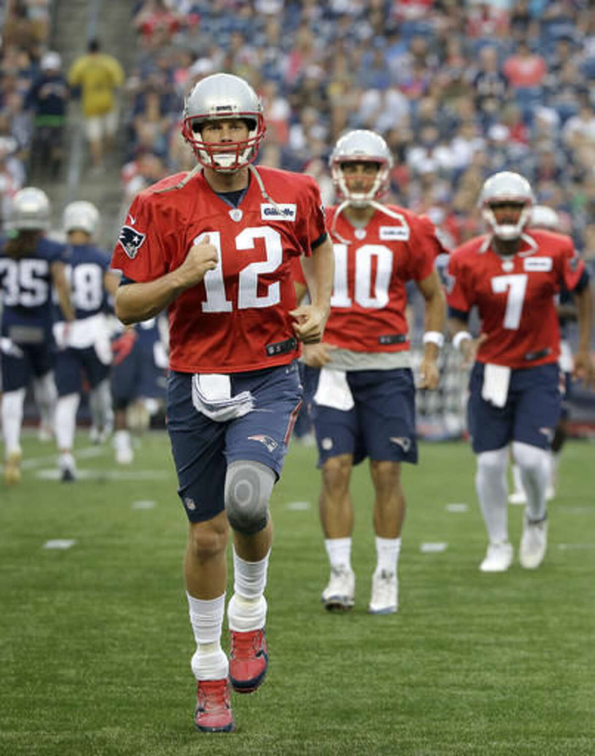 RB Kevin Faulk rocks a Tom Brady jersey to his Hall of Fame