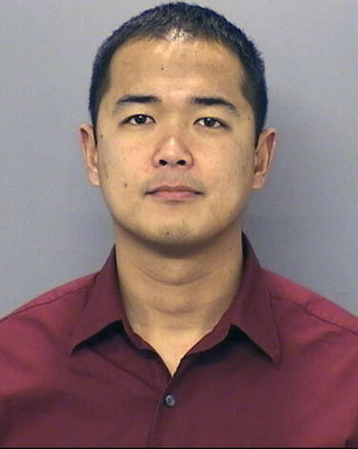 FILE - This undated file photo provided by the San Diego Police Department shows San Diego Police officer Jonathan De Guzman who was killed in a shooting Thursday, July 28, 2016. De Guzman, a 16-year veteran, is survived by a wife and two young children. The first of two memorial services will be held Thursday, Aug. 4, 2016, for De Guzman who was fatally shot during a traffic stop. De Guzman was shot five times at close range while in the driver's seat of his patrol car. His partner, 32-year-old Wade Irwin, was shot in the throat but is expected to recover. (San Diego Police Department via AP, File)
