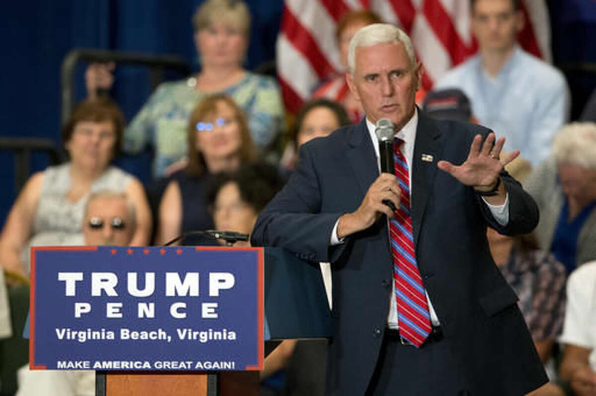 Republican vice presidential candidate, Indiana Gov. Mike Pence gestures as he answers a question during a town hall meeting in Virginia Beach, Va., Thursday, Aug. 4, 2016. (AP Photo/Steve Helber)