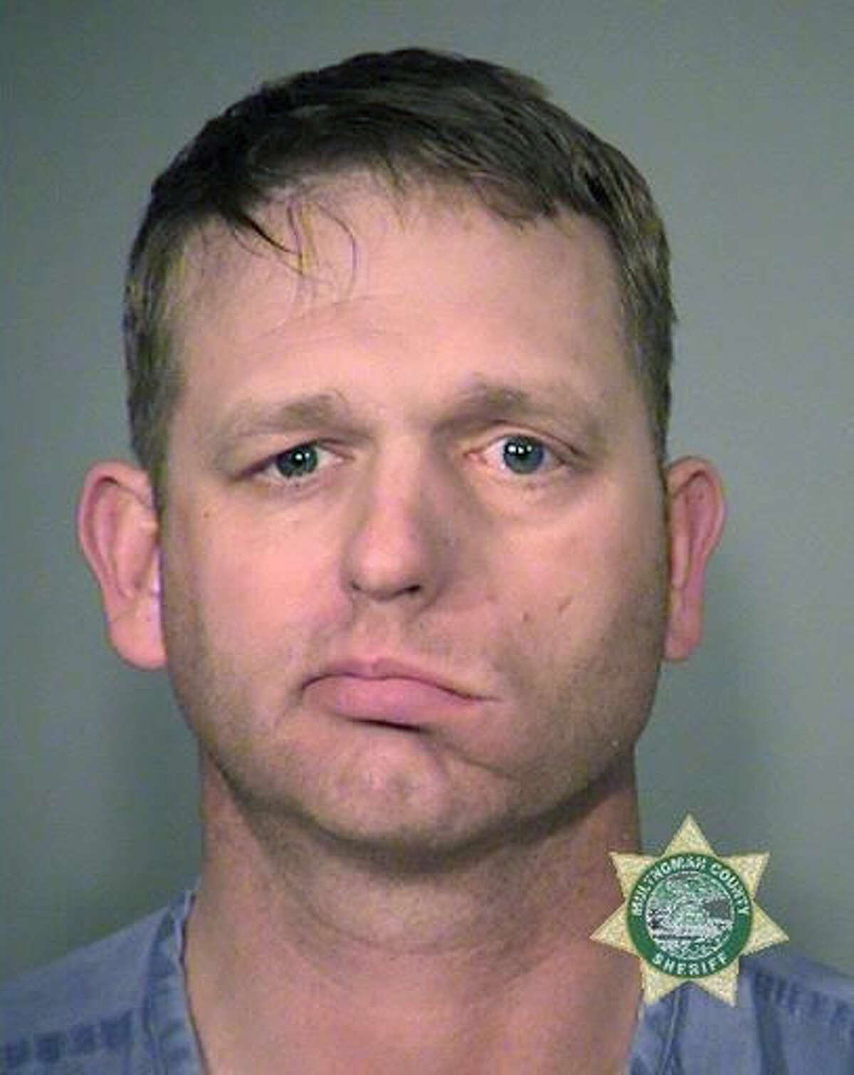 FILE - This Jan. 27, 2016, file photo provided by the Multnomah County Sheriff's Office, shows Ryan Bundy, who is in custody over the armed occupation of an Oregon bird sanctuary. Bundy was involved in an altercation with deputies in Portland, Ore., Tuesday, Aug. 9, 2016, when he refused to be handcuffed for transport. (Multnomah County Sheriff via AP, file)