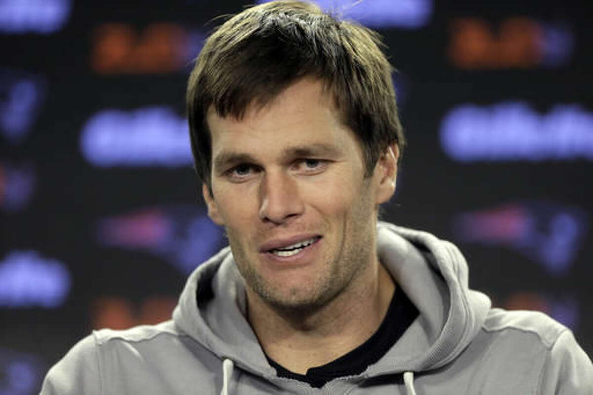 FILE - In this Jan. 12, 2016, file photo, New England Patriots quarterback Tom Brady takes questions from members of the media before an NFL football practice, in Foxborough, Mass. Brady says his decision not to pursue his appeal of a four-game suspension in the "Deflategate" saga was "a personal decision." The four-time Super Bowl winner spoke for the first time Friday, Aug. 5, 2016, at New England's training camp. (AP Photo/Steven Senne, File)