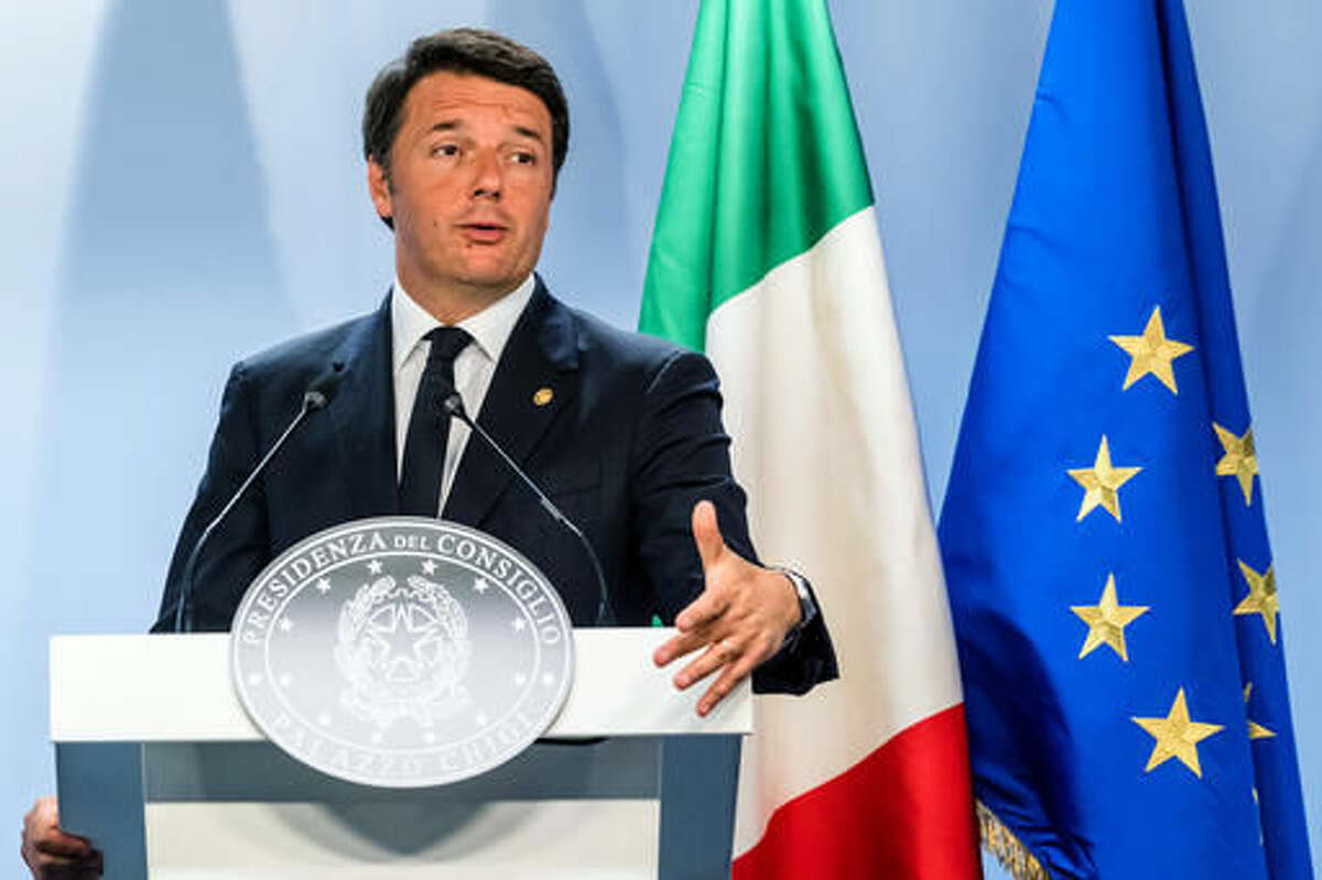 FILE - In this Wednesday, June 29, 2016 file photo, Italian Prime Minister Matteo Renzi speaks during an EU summit in Brussels. Renzi says holding the Olympics in Rome would be an answer to terrorists trying to cower people into a ``life of fear.’’ Renzi is in Rio de Janeiro to attend the opening of the Rio de Janeiro Games and promote Rome’s bid for the 2024 Games. (AP Photo/Geert Vanden Wijngaert, File)