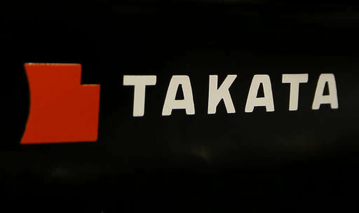 In this July 6, 2016 photo, the logo of Takata Corp. is seen at an auto-supply shop in Tokyo. Takata Corp., the Japanese company at the center of a massive global air bag recall, is sticking to its forecast of posting a 13 billion yen ($129 million) profit for the fiscal year through March. It reported on Friday, Aug. 5, 2016, an April-June profit of 2 billion yen ($19.8 million), down 33 percent from the same period the previous year, as quarterly sales slipped 7 percent to 169 billion yen ($1.7 billion). (AP Photo/Shizuo Kambayashi)