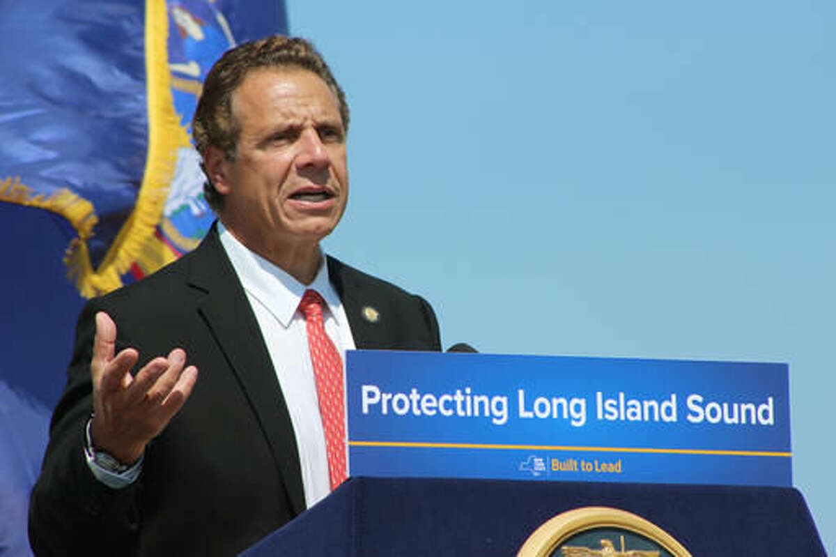 New York Gov. Andrew Cuomo speaks at an event on Thursday, Aug. 4, 2016, at Sunken Meadow State Park in Kings Park, N.Y. Cuomo said Thursday the state would consider legal action if federal officials proceed with plans to expand dumping sites. (AP Photo/Frank Eltman).