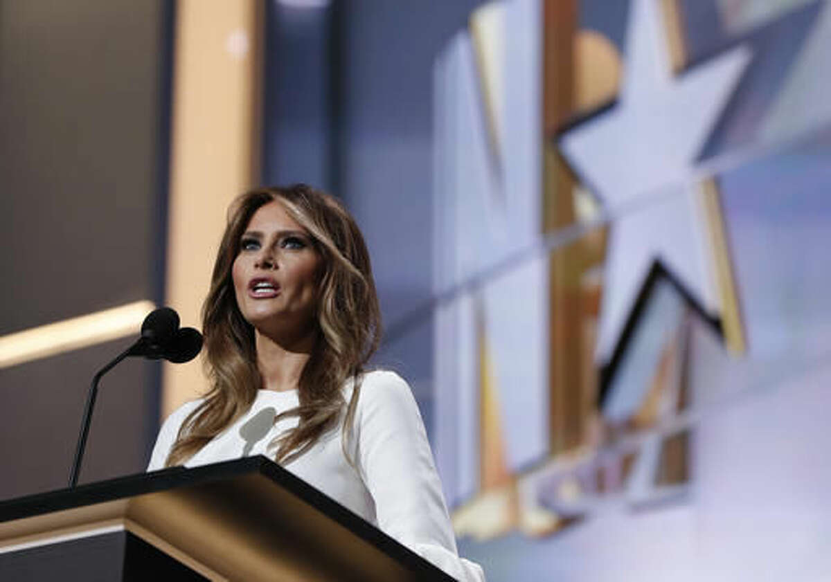 FILE - In this July 18, 2016 file photo, Melania Trump, wife of Republican Presidential Candidate Donald Trump speaks during first day of the Republican National Convention in Cleveland. Melania Trump's former modeling agent says the wife of the GOP presidential nominee obtained a work visa before she modelled professionally in the U.S. in the mid-1990s. (AP Photo/Carolyn Kaster, File)