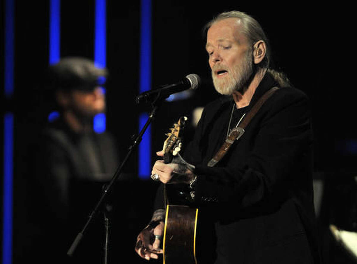 File- This Oct. 13, 2011, file photo shows Greg Allman performing at the Americana Music Association awards show in Nashville, Tenn. Allman has canceled planned live shows until late October due to “serious health issues.” In a statement released Friday, Aug. 5, 2016, the 68-year-old Allman says he’s currently under his doctor’s care at a facility. No more details were provided.(AP Photo/Joe Howell, File)
