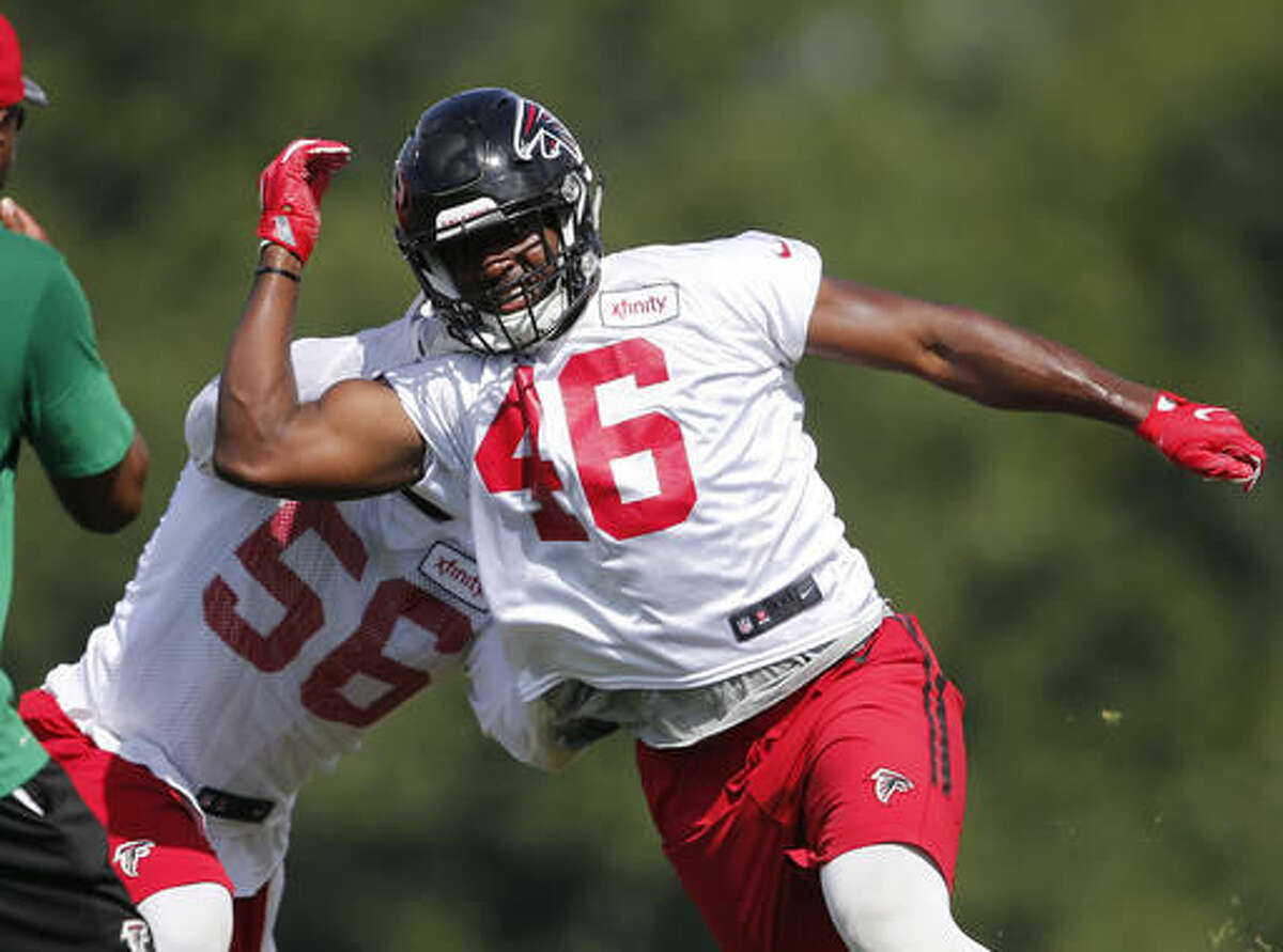 FILE - In this June 29, 2016, file photo, Atlanta Falcons linebacker Torrey Green (46) and linebacker Sean Weatherspoon (56) work a drill during an NFL football practice, in Flowery Branch, Ga. The Falcons have cut rookie free agent linebacker Torrey Green as Utah law enforcement authorities investigate allegations of sexual assault made against him while he was a student at Utah State last year. Falcons owner Arthur Blank said Green was cut Thursday morning, Aug. 4, 2016, after the team learned of the allegations the night before. (AP Photo/John Bazemore, File)